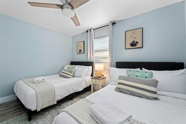 3485 Floral Dr, Largo, FL 33771 - bedroom featuring wood finished floors and a ceiling fan