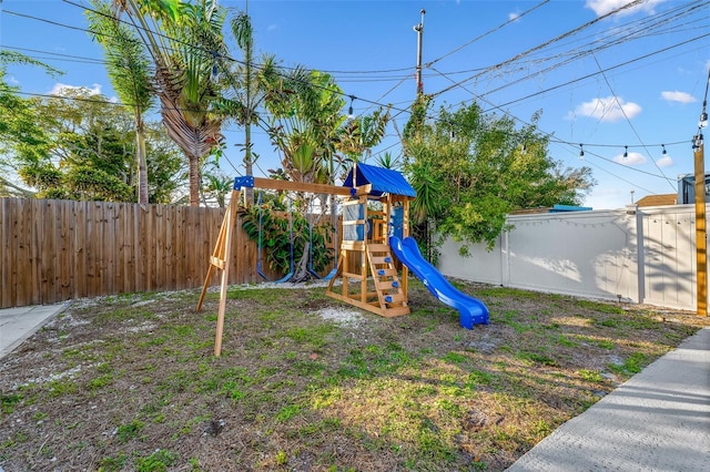 3485 Floral Dr, Largo, FL 33771 - view of jungle gym featuring a fenced backyard