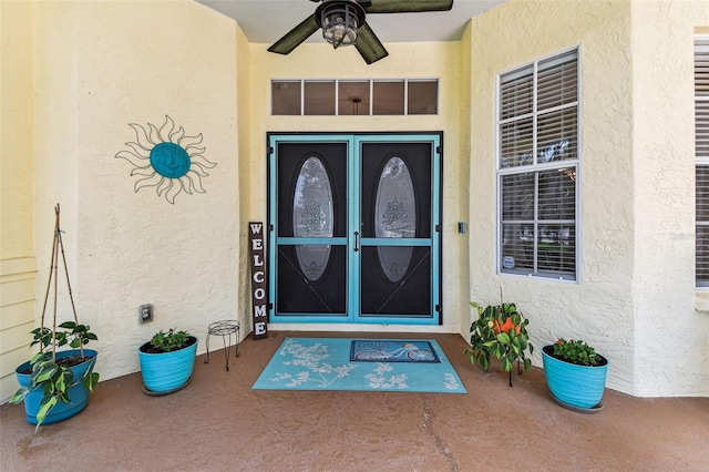 10306 Shalimar Wood Dr, Thonotosassa, FL 33592 - entrance to property featuring stucco siding and ceiling fan