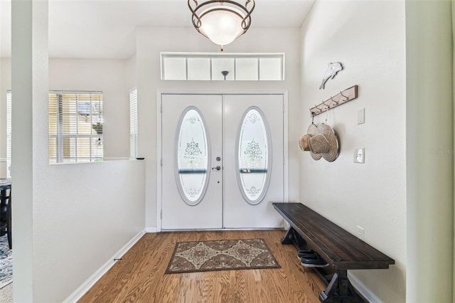 10306 Shalimar Wood Dr, Thonotosassa, FL 33592 - entrance foyer featuring wood finished floors and baseboards