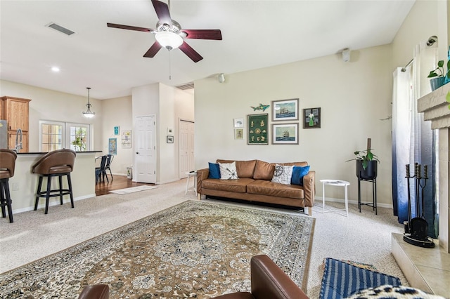 10306 Shalimar Wood Dr, Thonotosassa, FL 33592 - living room with light carpet, a ceiling fan, and baseboards