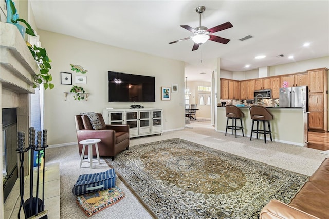 10306 Shalimar Wood Dr, Thonotosassa, FL 33592 - living area featuring baseboards, a ceiling fan, light colored carpet, and recessed lighting