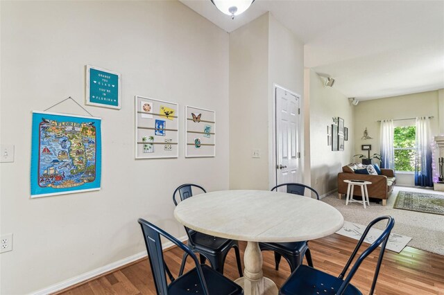 10306 Shalimar Wood Dr, Thonotosassa, FL 33592 - dining space featuring wood finished floors and baseboards