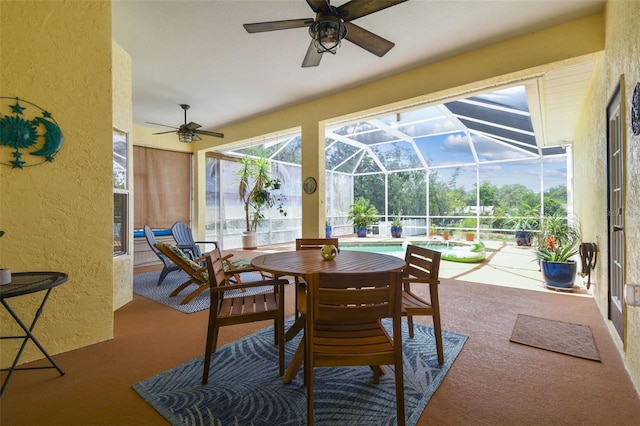 10306 Shalimar Wood Dr, Thonotosassa, FL 33592 - view of patio with ceiling fan, a lanai, a pool with connected hot tub, and outdoor dining space