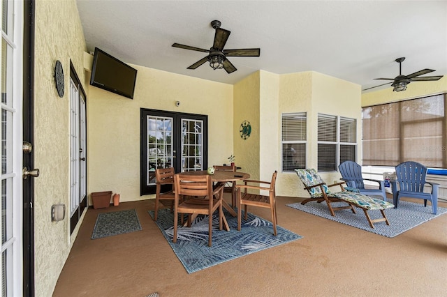 10306 Shalimar Wood Dr, Thonotosassa, FL 33592 - view of patio featuring ceiling fan and outdoor dining area