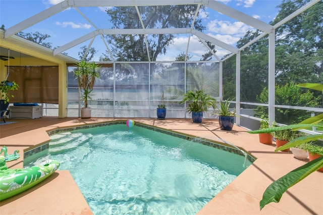 10306 Shalimar Wood Dr, Thonotosassa, FL 33592 - swimming pool with a patio and glass enclosure