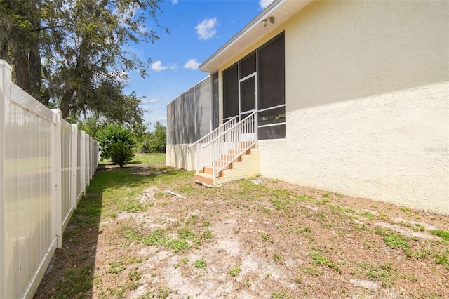 10306 Shalimar Wood Dr, Thonotosassa, FL 33592 - view of yard featuring a sunroom
