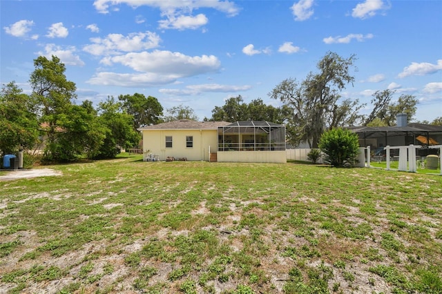 10306 Shalimar Wood Dr, Thonotosassa, FL 33592 - view of grassy yard with a lanai