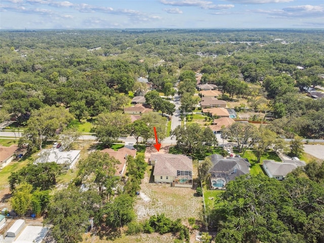 10306 Shalimar Wood Dr, Thonotosassa, FL 33592 - aerial overview of property's location with a heavily wooded area and nearby suburban area