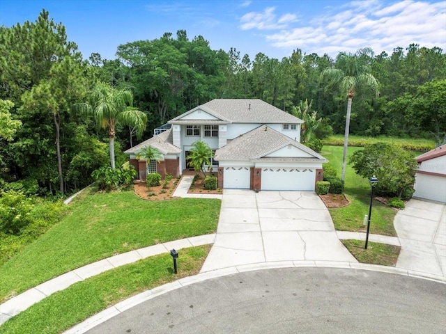 6127 Cezanne Ave, Lutz, FL 33558 - traditional home with concrete driveway, a front lawn, an attached garage, a view of trees, and roof with shingles