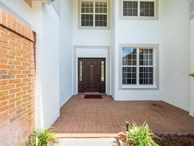 6127 Cezanne Ave, Lutz, FL 33558 - entrance to property featuring stucco siding