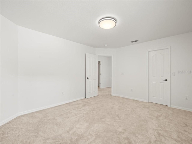 6127 Cezanne Ave, Lutz, FL 33558 - unfurnished bedroom with light carpet and baseboards