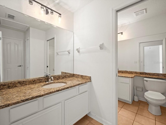 6127 Cezanne Ave, Lutz, FL 33558 - bathroom with vanity, tile patterned flooring, toilet, and baseboards