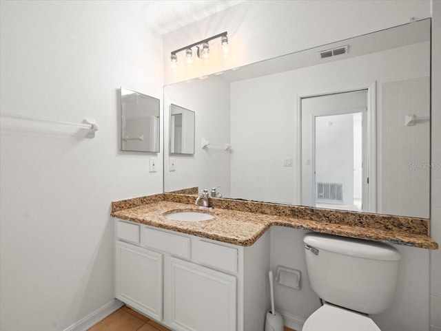 6127 Cezanne Ave, Lutz, FL 33558 - bathroom with toilet, vanity, and baseboards