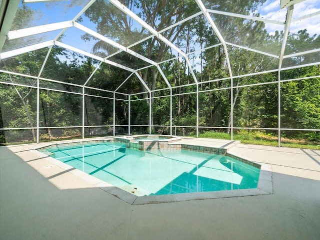 6127 Cezanne Ave, Lutz, FL 33558 - view of swimming pool with a pool with connected hot tub, a patio area, and glass enclosure