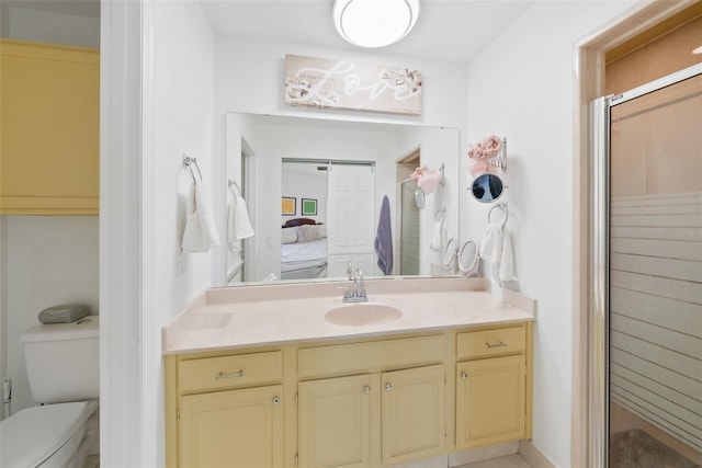 37420 Teaberry Loop, Zephyrhills, FL 33542 - full bath featuring vanity, a shower stall, connected bathroom, and toilet