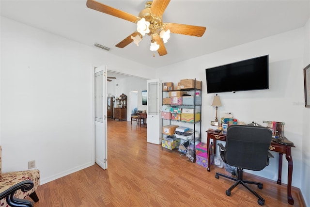 37420 Teaberry Loop, Zephyrhills, FL 33542 - office space featuring light wood finished floors, ceiling fan, and baseboards