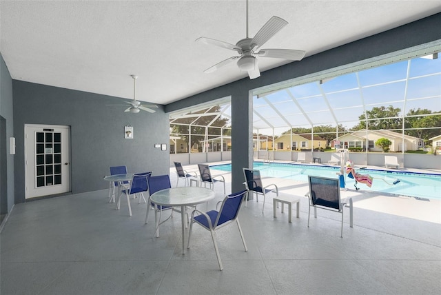 37420 Teaberry Loop, Zephyrhills, FL 33542 - view of patio with a ceiling fan and a lanai
