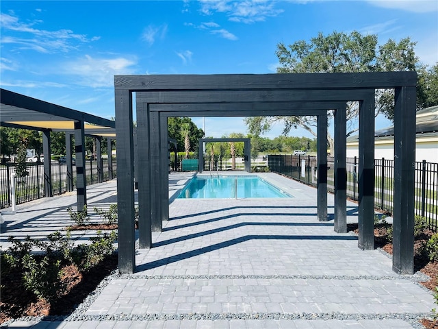 3428 Tranquil Trl, Kissimmee, FL 34747 - view of swimming pool featuring a patio