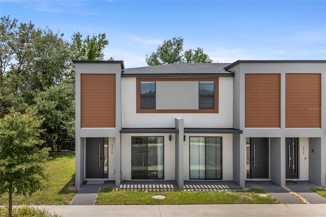 3428 Tranquil Trl, Kissimmee, FL 34747 - modern home featuring stucco siding