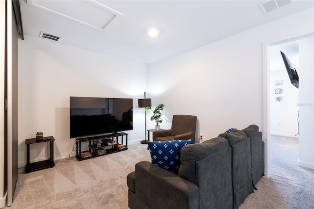 3428 Tranquil Trl, Kissimmee, FL 34747 - living area with carpet, attic access, and baseboards