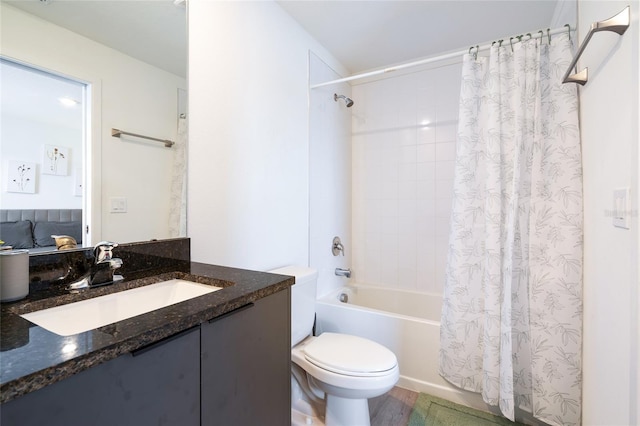 3428 Tranquil Trl, Kissimmee, FL 34747 - bathroom with shower / tub combo with curtain, vanity, toilet, and wood finished floors
