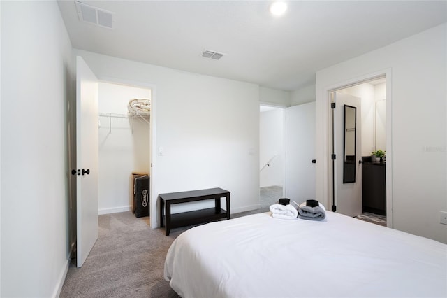 3428 Tranquil Trl, Kissimmee, FL 34747 - carpeted bedroom with a spacious closet, baseboards, a closet, and connected bathroom