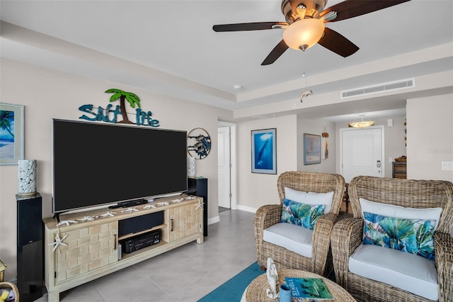 223 Island Way Unit 7F, Clearwater Beach, FL 33767 - living area featuring a ceiling fan, baseboards, light tile patterned floors, and a raised ceiling