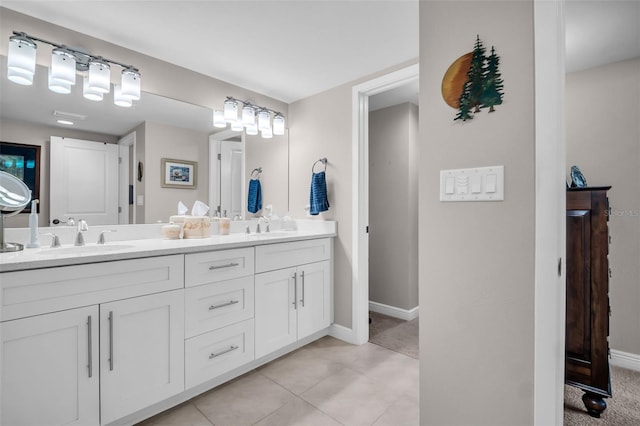 223 Island Way Unit 7F, Clearwater Beach, FL 33767 - full bath with double vanity, baseboards, and tile patterned flooring