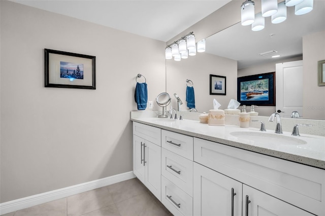 223 Island Way Unit 7F, Clearwater Beach, FL 33767 - full bath featuring double vanity, tile patterned floors, and baseboards