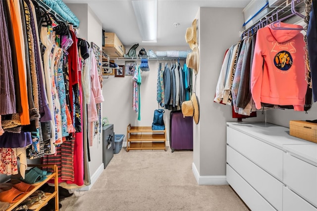 223 Island Way Unit 7F, Clearwater Beach, FL 33767 - walk in closet featuring carpet flooring
