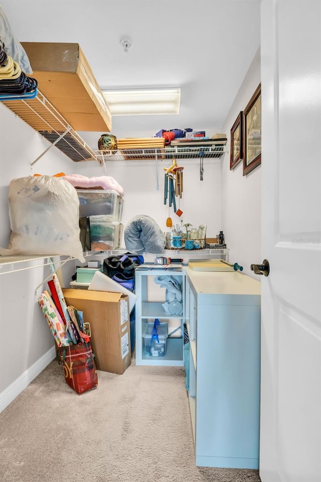 223 Island Way Unit 7F, Clearwater Beach, FL 33767 - storage room with independent washer and dryer