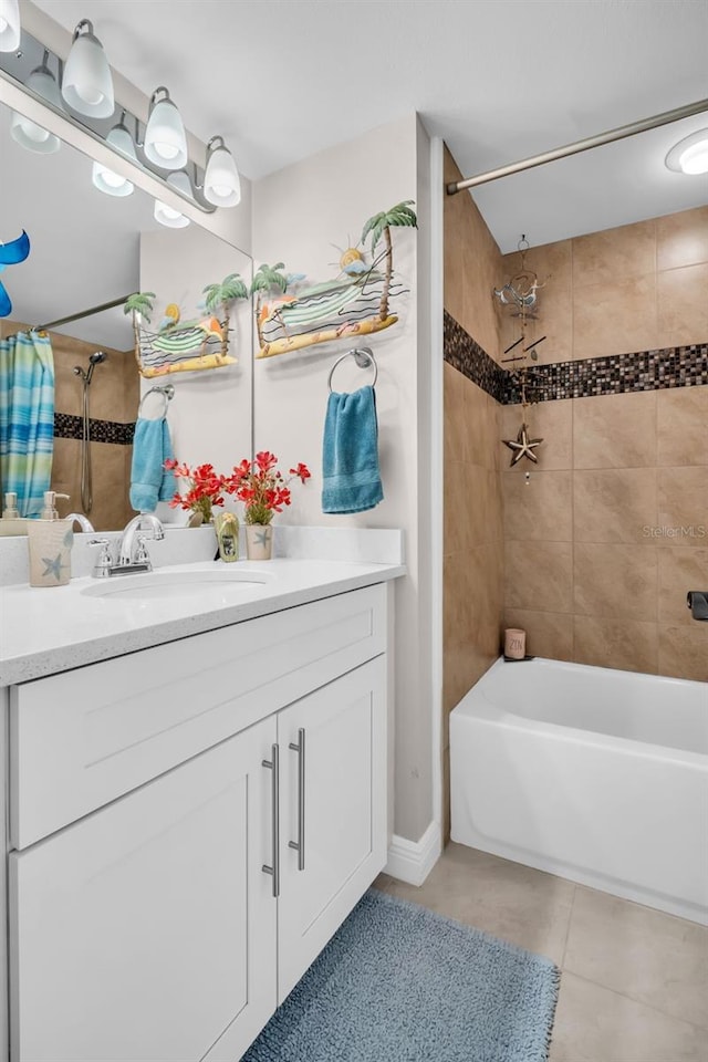 223 Island Way Unit 7F, Clearwater Beach, FL 33767 - full bathroom with tile patterned floors, shower / bathtub combination with curtain, and vanity