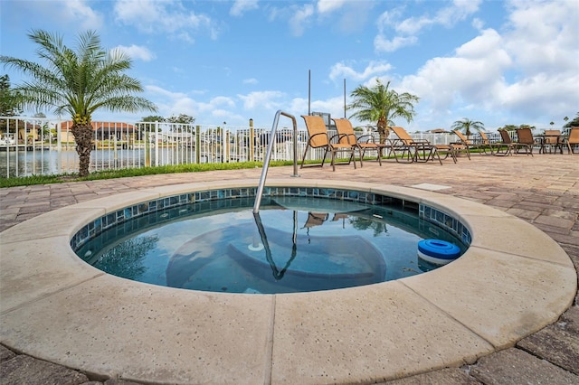 223 Island Way Unit 7F, Clearwater Beach, FL 33767 - view of pool with a pool and a water view
