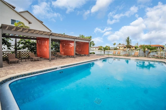 223 Island Way Unit 7F, Clearwater Beach, FL 33767 - community pool featuring a patio area and a pergola