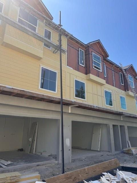 4208 W Carmen St Unit C, Tampa, FL 33609 - back of property featuring an attached garage