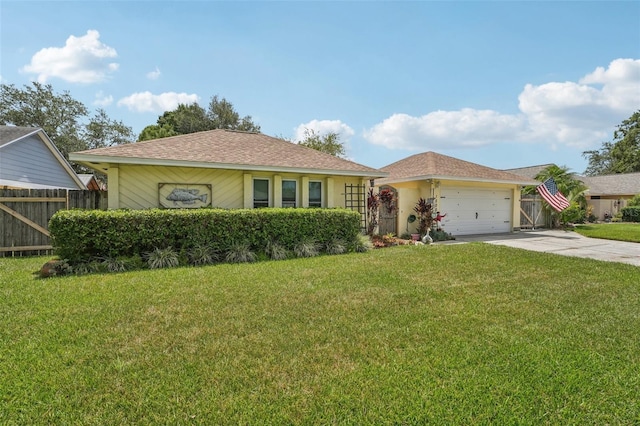 15005 Roundup Dr, Tampa, FL 33624 - ranch-style house with concrete driveway and a garage