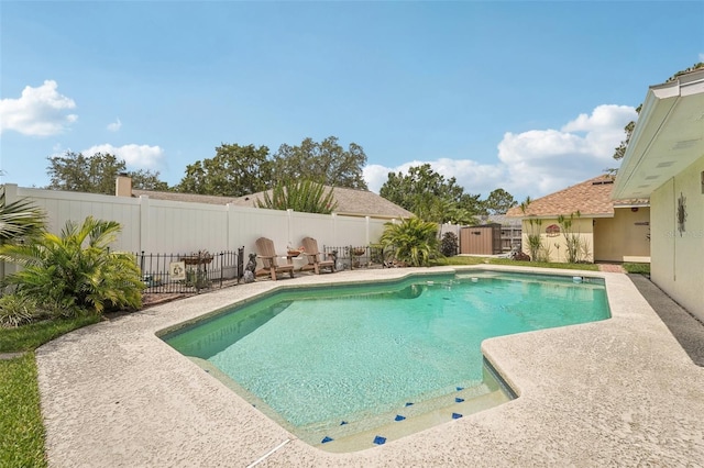 15005 Roundup Dr, Tampa, FL 33624 - view of pool featuring a fenced backyard and a patio
