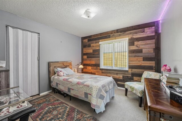 15005 Roundup Dr, Tampa, FL 33624 - carpeted bedroom with wood walls and a textured ceiling