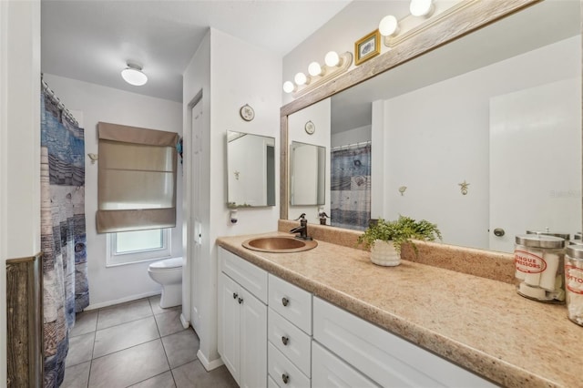 15005 Roundup Dr, Tampa, FL 33624 - full bathroom featuring toilet, vanity, and tile patterned floors