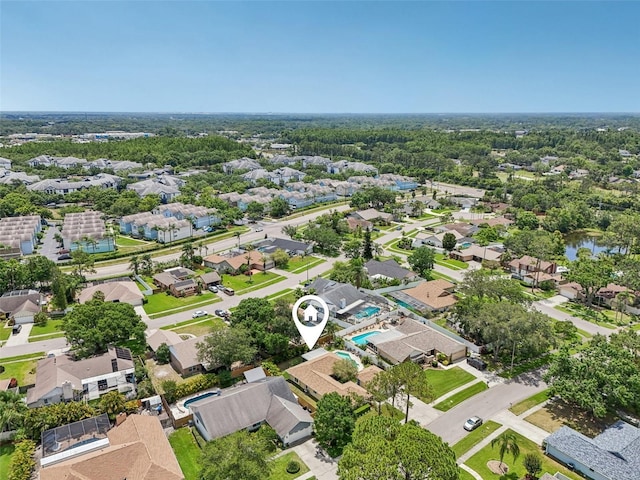 15005 Roundup Dr, Tampa, FL 33624 - aerial view of property and surrounding area featuring nearby suburban area