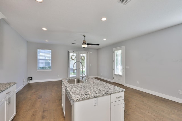 6619 S Manhattan Ave Unit 1, Tampa, FL 33616 - kitchen with a sink, recessed lighting, healthy amount of natural light, wood finished floors, and french doors