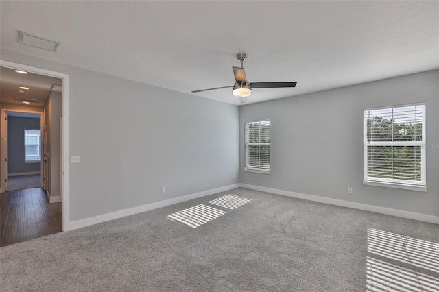 6619 S Manhattan Ave Unit 1, Tampa, FL 33616 - carpeted empty room with baseboards and a ceiling fan