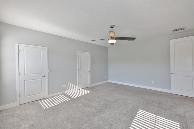 6619 S Manhattan Ave Unit 1, Tampa, FL 33616 - carpeted empty room with ceiling fan and baseboards