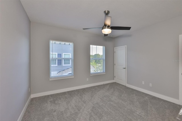6619 S Manhattan Ave Unit 1, Tampa, FL 33616 - spare room with carpet floors, a ceiling fan, and baseboards