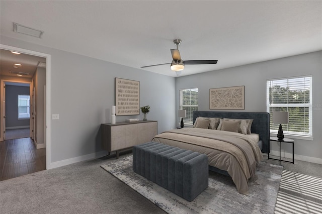 6619 S Manhattan Ave Unit 1, Tampa, FL 33616 - bedroom featuring carpet floors, baseboards, and ceiling fan