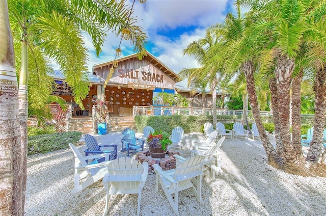 6619 S Manhattan Ave Unit 1, Tampa, FL 33616 - view of patio featuring a fire pit