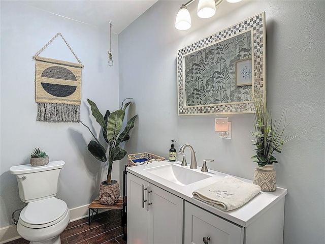 1014 Sylvia Ln, Tampa, FL 33613 - bathroom featuring wood finished floors and vanity
