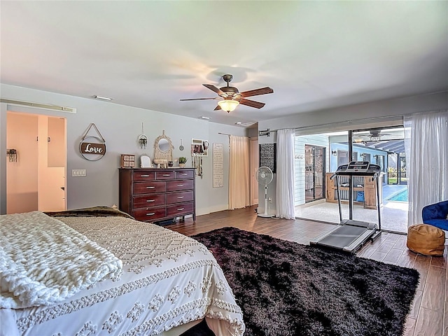 1014 Sylvia Ln, Tampa, FL 33613 - bedroom with access to outside, dark wood-style floors, and ceiling fan