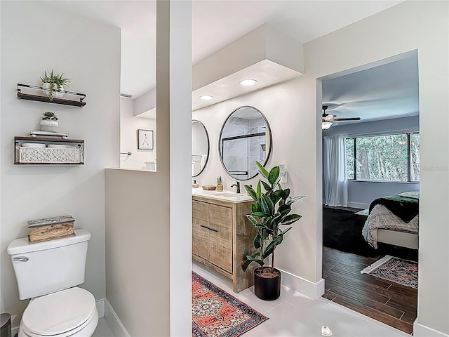 1014 Sylvia Ln, Tampa, FL 33613 - full bath with vanity, ensuite bathroom, ceiling fan, and a shower
